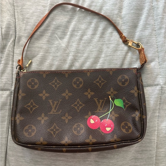 Louis Vuitton Handbags - Louis Vuitton Brown Monogram Wristlet with Red Cherry Accent